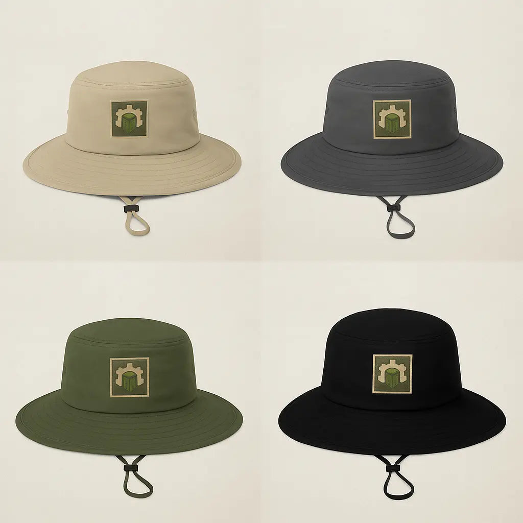 Four Columbia Booney hats in black, fossil, collegiate navy, and carbon colors, each with TERRAINWORK square logo embroidered on the front.