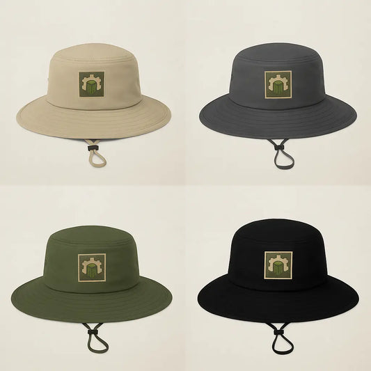 Four Columbia Booney hats in black, fossil, collegiate navy, and carbon colors, each with TERRAINWORK square logo embroidered on the front.