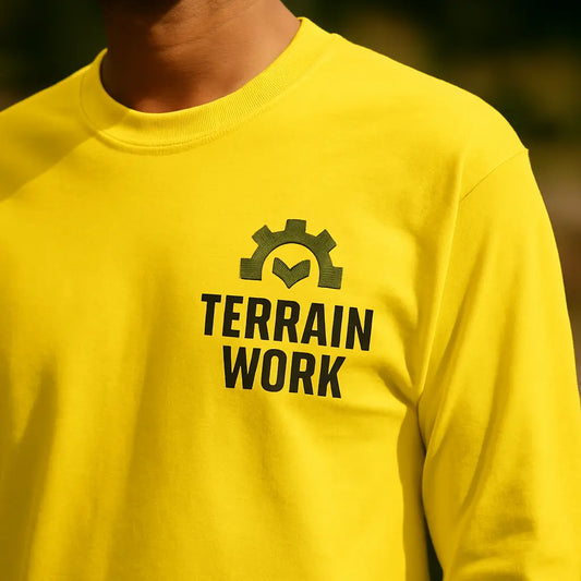 Close-up of chest logo on TERRAINWORK workwear long sleeve tee