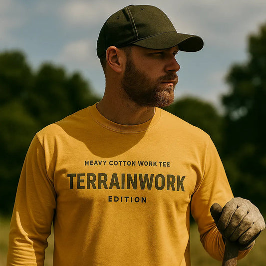 Worker outdoors wearing TERRAINWORK heavy cotton long sleeve tee, ideal for crews