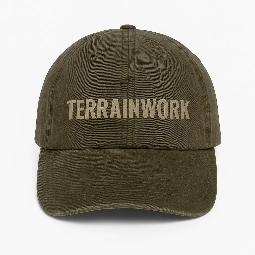 Clean product image of dark olive green TERRAINWORK dad hat on white background, ideal for marketplace listing